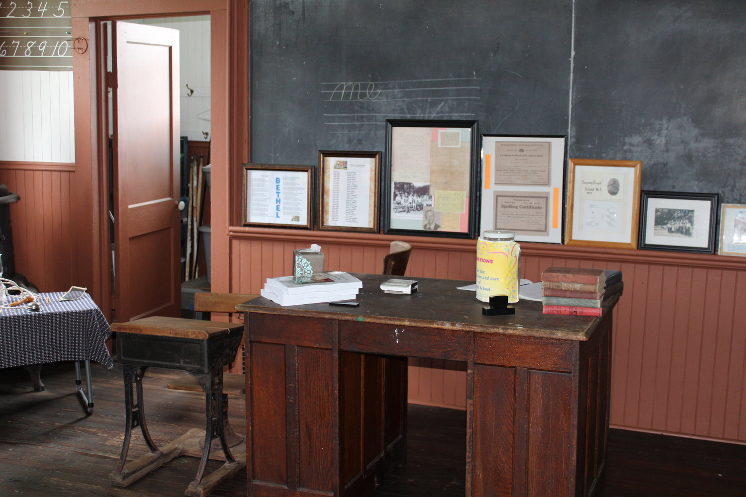 The front of the tiny classroom looks like it hasn't changed in decades.